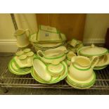 Large amount of green banded and gilt decorated dinner ware by Queens Green, from the Soho pottery,
