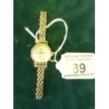 Superb Ladies 9ct gold Longines Vintage watch with a circular dial, set with Longines logo and