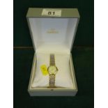 Omega a Ladies stainless steel and gold plated bracelet watch, with double deployment clasp in