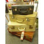 4 old suitcases,
