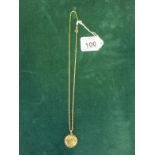 1974 Full Sovereign set in 9ct gold mount with accompanying 18" 9ct gold chain total weight 12 grams