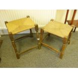2 x similar 1920's rattan upholstered foot stools