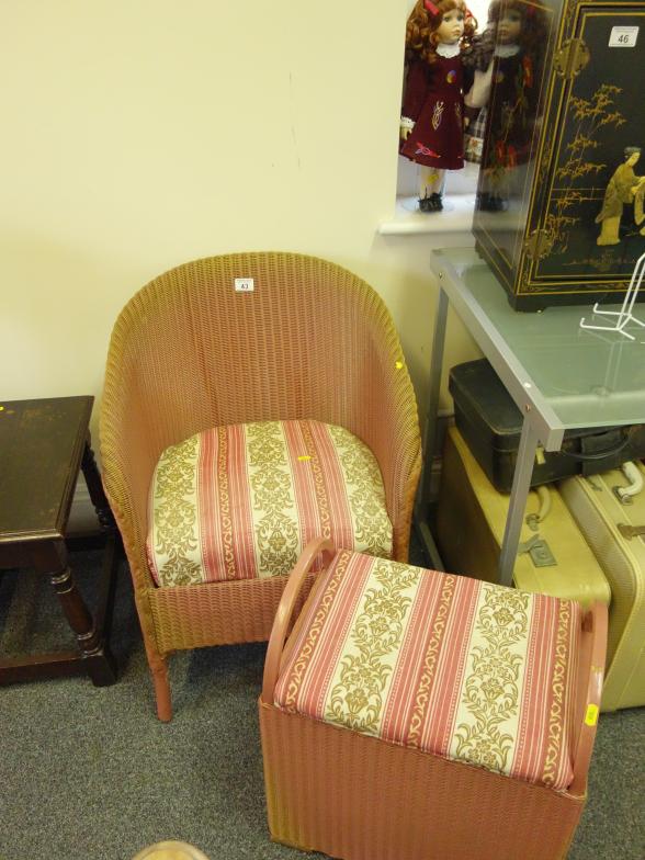 Lloyd Loom a pink chair and similar linen basket,