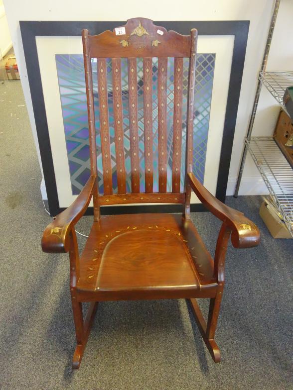 Hardwood antique style rocking chair with brass inlaid decoration,