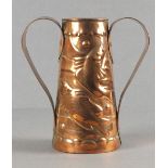 A Newlyn Copper Twin handle tapering vase decorated a continuous design of fish with riveted