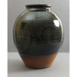 * Eddie HOPKINS A stoneware vase of ovoid design with combed decoration in greens and browns Circa