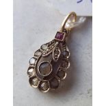 Rose diamond pendant with a red stone