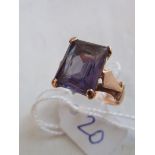 Baguette cut single stone amethyst ring set in 18ct