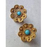 Pair of high carat gold earrings with turquoise centres to the flower heads