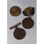 A pair of WWI medals - The Territorial Ware Medal for Voluntary Service Overseas 1914/19 and the