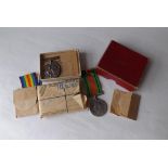 A pair of WW1 medals to Pte H.C. Washington A.S.C. in Woolwich Reg.  Box and a defence medal