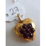 9ct red stone set heart shaped pendant 2g