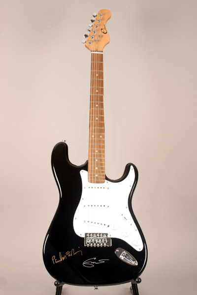 Paul McCartney and Eric Clapton signed guitar A black and white Eleca electric guitar signed by Paul