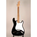 Paul McCartney and Eric Clapton signed guitar A black and white Eleca electric guitar signed by Paul