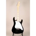 David Bowie, signed guitar. A black California electric-guitar signed in gold metallic felt tip