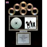 Westlife, 'Coast to Coast' Framed commemorative disc presented to Louis Walsh, on achieving sales of