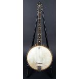 A tenor banjo with a Waverly head Bought in Boston in 1960s by the previous owner who was playing