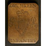 Circa 1790. Drumkeen Infantry, Co. Donegal, shoulder belt plate. A brass rectangular convex shoulder