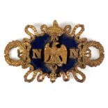 Early 19th Century French belt buckle An ormolu and blue enamel belt buckle, centred by an