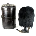 A Royal Dublin Fusiliers officer's bearskin and case The bearskin on a wicker frame, with leather