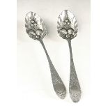 A pair of George III Cork silver table spoons by Carden Terry Engraved and decorated in the 19th