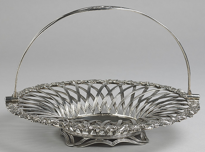 A William IV Irish silver basket The cast rim of bunches of grapes enclosing open-work sides on - Image 2 of 2