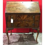 Walnut fall front bureau with shell carved knees