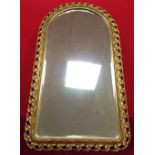 Gilt framed bevelled edge arched wall mirror