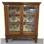 Mahogany glazed, leaded double door bookcase