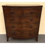 Mahogany bow fronted chest of two short and three long drawers on splayed legs