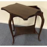 Mahogany fold over two tier games table with baise playing surface
