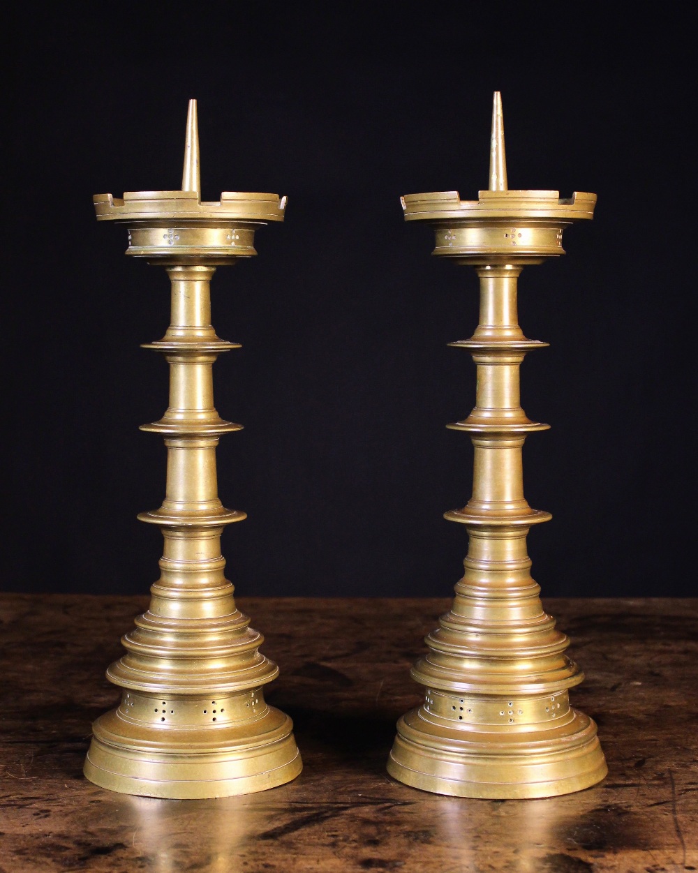 A Pair of Gothic Revival Pricket Sticks.