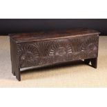 A 17th Century Carved Boarded Oak Coffer