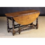A 17th Century Oak Gateleg Table. The ne