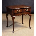 A Small 18th Century Oak Lowboy.  The to