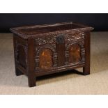 A Small Inlaid Oak Coffer.  The lid edge