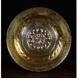 A 16th Brass Nuremberg Alms Dish. The em