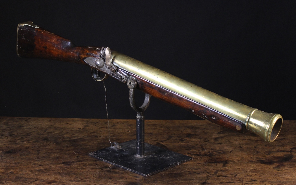 An 18th Century English Flintlock Brass-