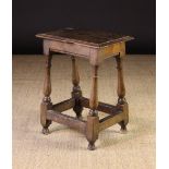 An 18th Century Oak Joint Stool.  The to