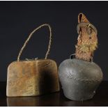 Two Antique Cow Bells: one of metal, the