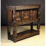 A Carved Oak Livery Cupboard.  The mould