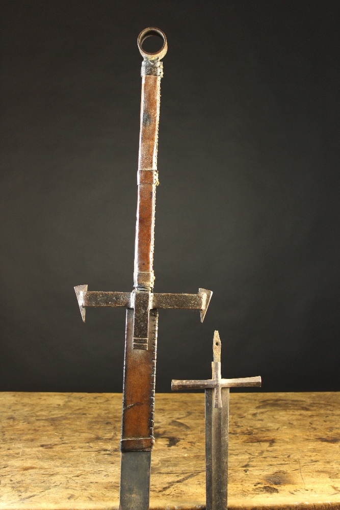 A Replica Gothic Two-hand Sword with leather bound hilt, 54 ins (137 cms) in length, and a Gothic