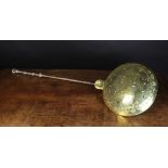 A 17th Century Brass Warming Pan.  The d