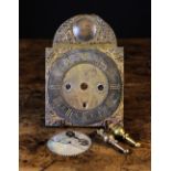 A Six inch (5.2 cm) brass clock face wit