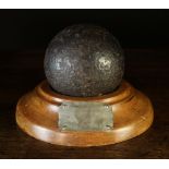 A 19th Century Cannon Ball mounted on a