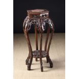 A Chinese Carved Hardwood Stand.  The he