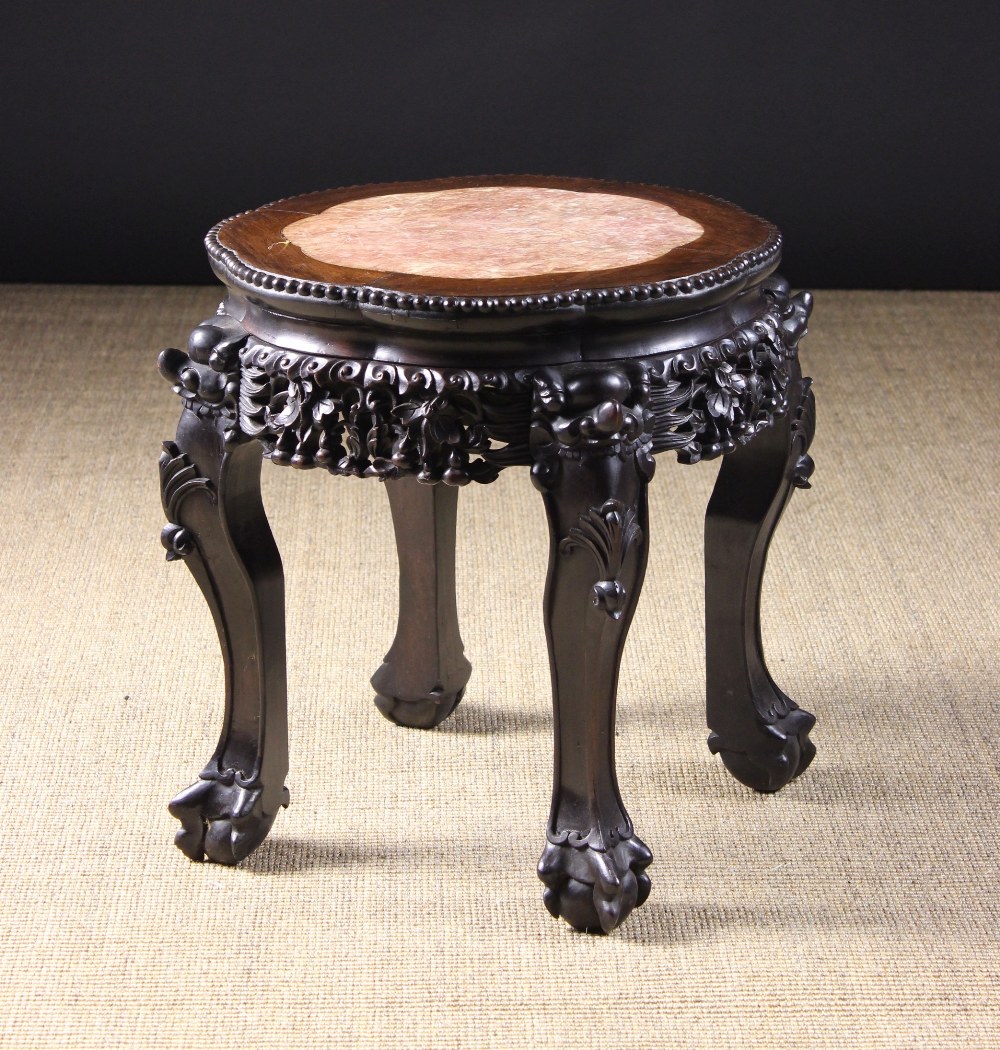 A Chinese Carved Hardwood Stand.  The pe