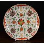 A Chinese Plate enamelled with flowers,