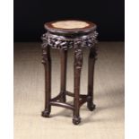 A Chinese Carved Hardwood Stand.  The pe