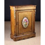 A Victorian Burr Walnut Side Cabinet with inlaid decoration and gilt bronze mounts.